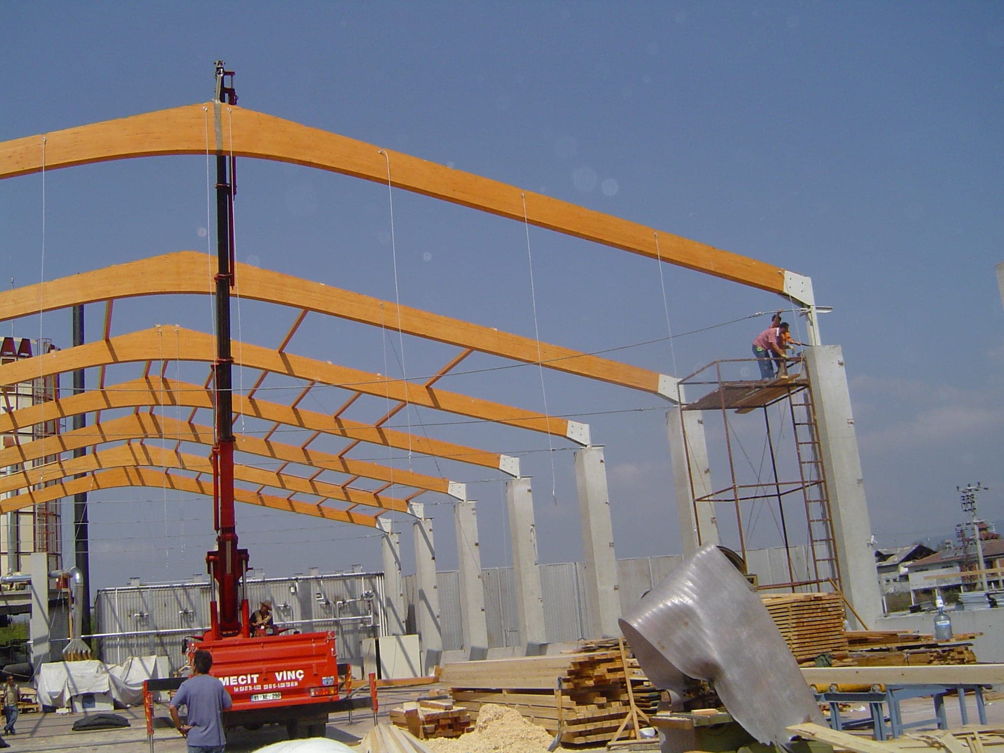 Nativu glulam beams being installed on a hall roof.
