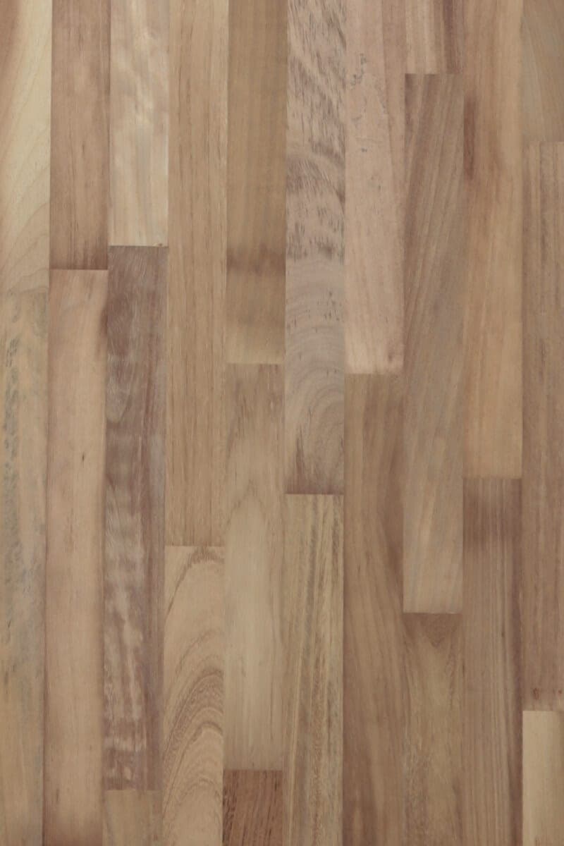 Iroko solid wood panel surface, finger-jointed staves, grade A.