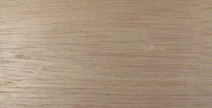 Light red meranti surface: pinkish light brown wood, close-up.