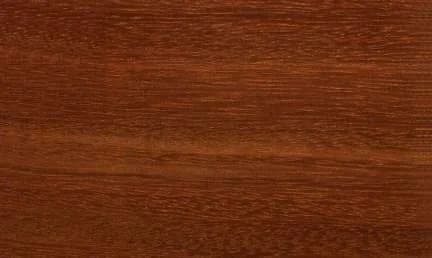 Tali lumber surface: darkened red-brown wood, close-up.